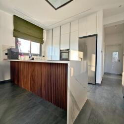 Michalis A Germanos A White Glossy Kitchen With Tall Units And A Spacious Island