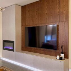 Michalis A Germanos Stylish And Functional Sleek Wooden Tones Hidden Storage And A Cozy Fireplace